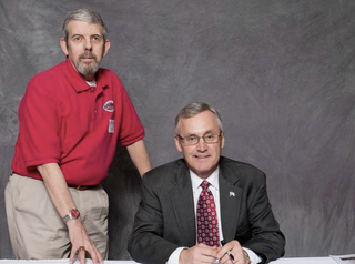 Illustration for article titled Many Special People Excitedly Posed For Pictures With Jim Tressel Last Week